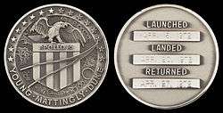  Apollo 16 mission emblem and crew names (front). Dates (launch, lunar landing, and return) (back)