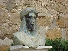 A bust statue of Muhammad I in Islamic garb