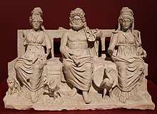 Statue of three figures, seated side by side