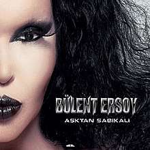 Face of Bülent Ersoy. The words "Aşktan Sabıkalı" is embossed in the middle of the image.