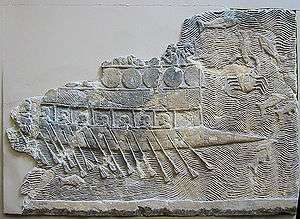 WA 124772: An Assyrian warship carved into stone (700&ndash;692 BC) from the reign of Sennacherib. Nineveh, South-West Palace, Room VII, Panel 11. British Museum.