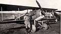 Auguste Baux stands next to his SPAD