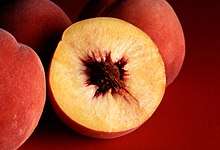 The colour peach represents the flesh of the peach fruit.