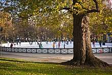 Ice skaters at Boston Common Frog Pond in downtown Boston, Massachusetts