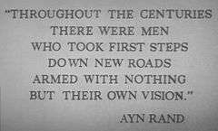 Engraving in capital letters that reads: "Throughout the centuries there were men who took first steps down new roads armed with nothing but their own vision. Ayn Rand"
