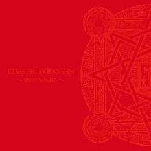 A red album cover, with the words "LIVE AT BUDOKAN" and "~RED NIGHT~" on the left side and one half of a circular design on the right side, both in a lighter red color.