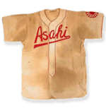 Swatch from original Vancouver Asahi baseball team jersey. The Asahi Japanese-Canadian baseball team was founded in Vancouver in 1914. While prevalent racism prevented players from playing in "white" leagues, the Asahi's unique style of play attracted large white audiences, peaking in the 1930's, and they became a beloved championship team. With the bombing of Pearl Harbor by Japan in 1941, Japanese-Canadians were declared "enemy aliens" and either deported to Japan or dispersed among internment camps in BC and elsewhere. The team was disbanded during this period. The exact date and player associated with this jersey is unconfirmed but the design suggests it is from the mid 1930s.