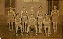 Basketball players in a group photograph