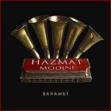 A red harmonica sits on a black background, labeled "Hazmat Modine" with "Bamahut" in small white letters below. Five brass musical horns protrude from above the harmonica.