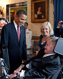 Photograph of Barack Obama talking to Stephen Hawking in the White House