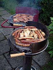 Various foods being grilled