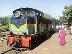 Two-tone blue and gold loco