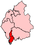 A small constituency in the south of the county. It includes a long but very thin island to the west of the mainland part of the constituency.