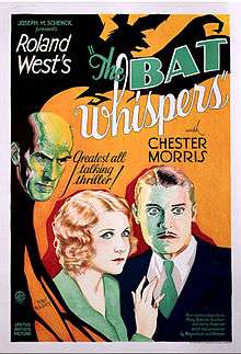 Color movie poster for The Bat Whispers. A blond man and woman stare ahead; a bald man scowls at them from above. The shadow of a bat surrounds them on the upper left.