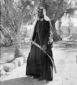 Bedouin sheikh with a sword