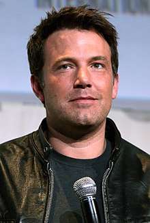 Ben Affleck looks slightly away from the camera