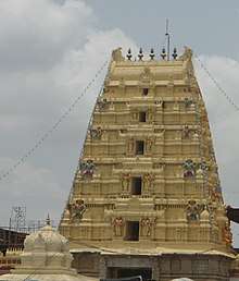 Tower of the temple painted in light yellow.