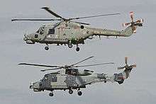 A Lynx HMA8RSU (top) operated by 815sqn and Wildcat HMA2.