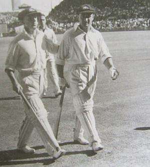 Don Bradman and Sid Barnes walk from the field in 1946