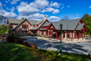 The two-story Tudor Revival library building