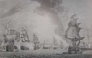 eight large ships with tattered sails and twisted masts sail across a choppy sea, some with smoke billowing from their sides. Other ships are less distinct, in the background.  In the background a pillar of smoke rises into a cloudy sky. In the proper left foreground is a ship with two small boats and some floating wreckage beside it.