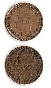 Pennies showing George V and George VI