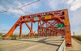  Front portion of a red-colored steel bridge