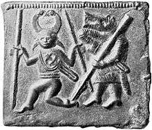Black and white photograph showing one of the four Torslunda plates