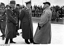 Photograph of Gauleiter Franz Hofer meets with Wilhelm Frick, minister of the interior, in February 1939.