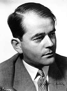 Monochrome photograph of the upper body of Albert Speer, signed at the bottom