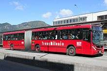 Red articulated bus