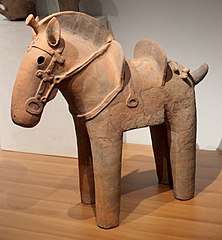 Terra-cotta horse, with saddle and bridle