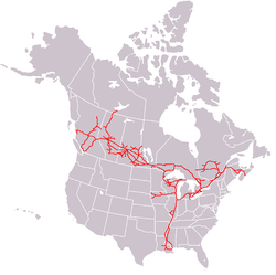 A map of Cananda and the United States showing the routes of Canadian National Railways in clear red lines.