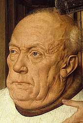 Detail showing the aging and grizzled face of Canon van der Paele