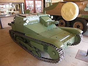 Colour photo of a small tankette, painted light green