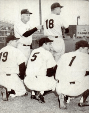 Stengel with some of his players. The uniform numbers spell out "18" and "1951", signifying the Yankee hopes for an 18th pennant that year