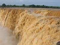 Chitrakot Falls with full muddy flow