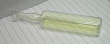 A glass container filled with chlorine gas