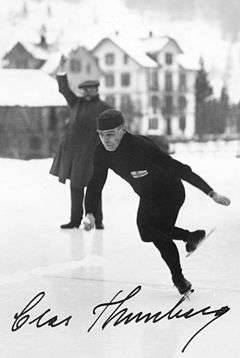 A signed black and white photograph of Clas Thunberg skating