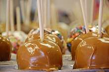 Close up of caramel apples in a row