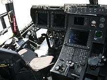 View of left instrument panel and unusual stick and throttle controls