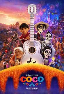 Theatrical release poster depicting the characters Coco, Dante the dog, Miguel, Héctor, Ernesto, and Imelda when viewing clockwise from the bottom left around Ernesto's white, Day of the Dead-styled guitar. The guitar has a calavera-styled headstock with a small black silhouette of Miguel, who is carrying a guitar, and Dante at the bottom. The neck of the guitar splits the background with their village during the day on the left and at night with fireworks on the right. The film's logo is visible below the poster with the "Thanksgiving" release date.