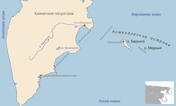 The triangular Kamchatka Peninsula is to the left, and on the right half are the small Bering Island, which is rectangular and slanted left, and Copper Island, which is also rectangular and slanted left but smaller than Bering Island.