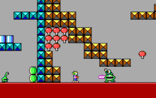 Side view of Commander Keen facing a Martian Garg enemy, surrounded by a structure composed of square blocks.