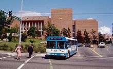 A Community Transit bus turning a corner to leave the University of Washington campus