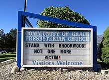 A church sign reading: "STAND WITH BROOKWOOD! NOT ONE MORE VICTIM!"