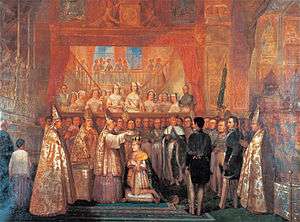 A painting depiciting a kneeling man being crowned by a mitered bishop, and surrounded by clerics and uniformed courtiers with a crowd of onlookers in the background