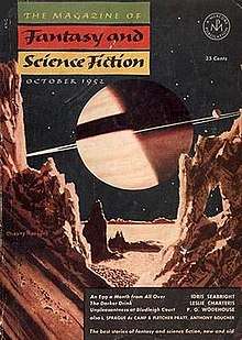 Magazine cover depicting a view of a ringed planet from the surface of another planet or moon
