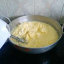 In the cream butter method, cream separated from milk must be churned to produced butter. The butter then undergoes heat clarification.