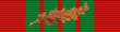 Red ribbon with vertical green stripes in the center and a palm leaf in the middle